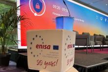 White cube featuring ENISA's anniversary logo, displayed at ENISA's 2nd Policy Conference.